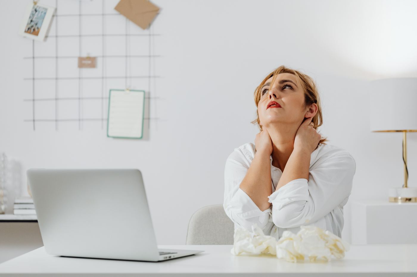 nonprofit staff member looking overwhelmed at their desk - Nonprofit marketing consultant nonprofit staff member looking overwhelmed at their desk - Nonprofit marketing consultant